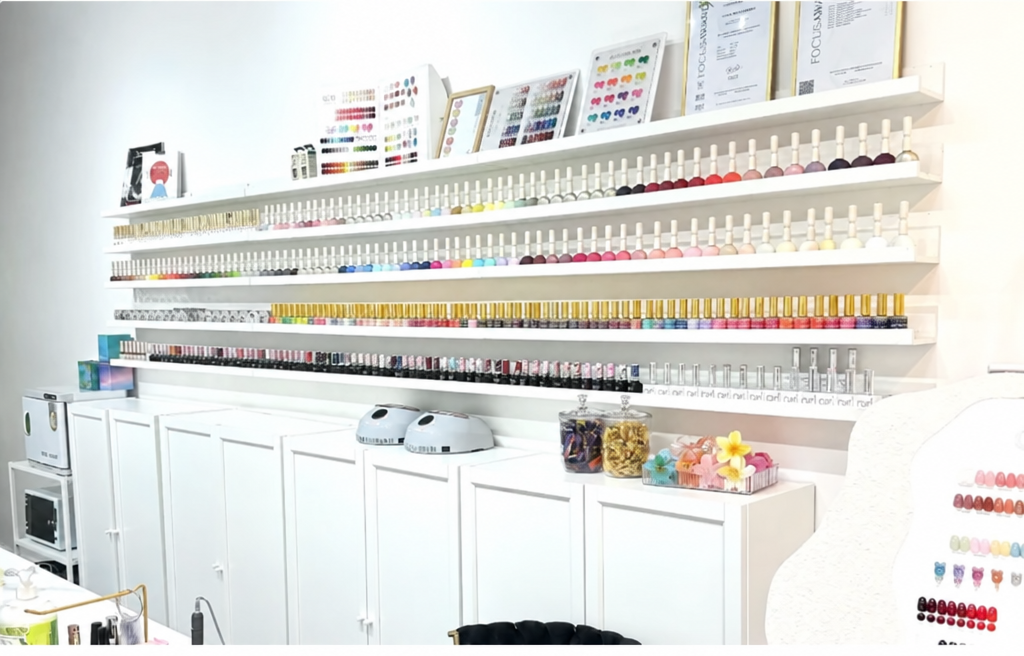 Wall of nail polish shades inside TW Nail Club