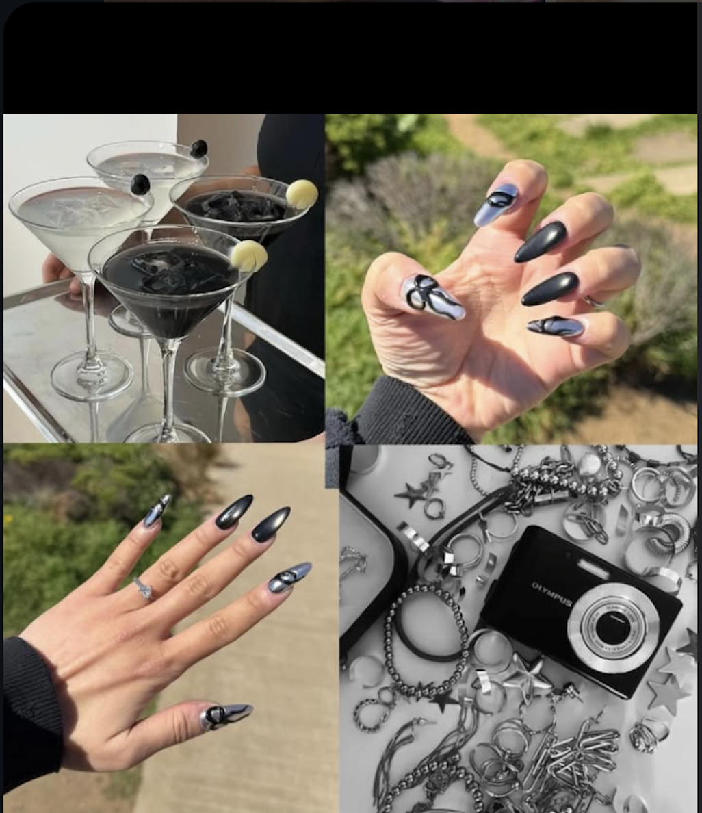 Black chrome stiletto nails with butterfly art