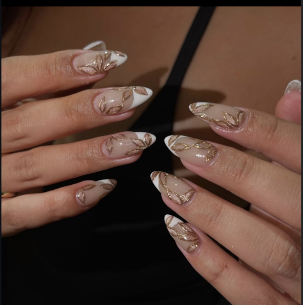 Nude nails with white French tips and gold leaf